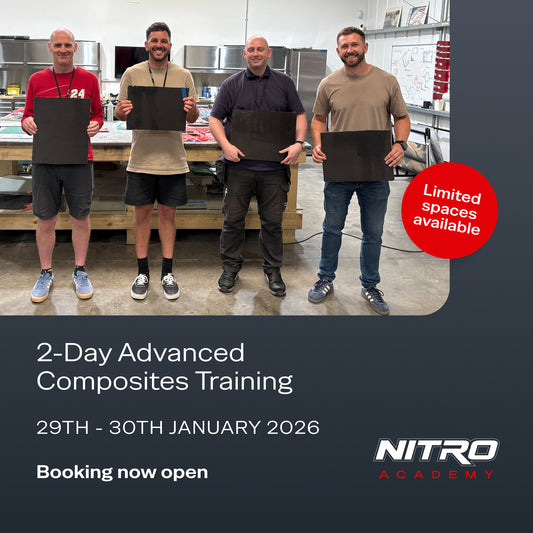 Four attendees holding composite panels during a 2-day advanced composites training course at Nitro Academy, January 2026.